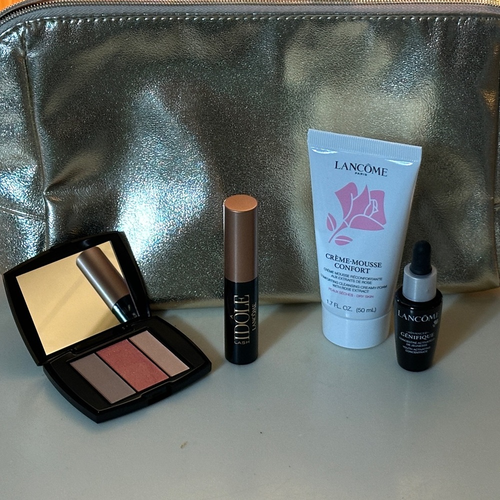 Lancôme gold foil makeup bag with travel size products